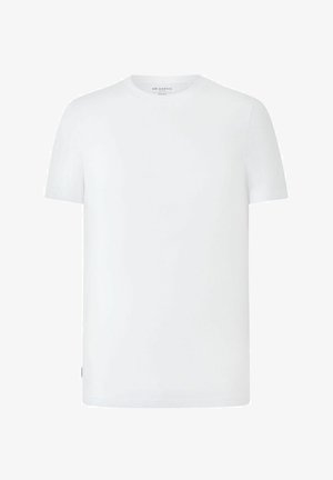 T-shirt blanc à manches courtes avec col rond, petit tag de marque en bas à gauche et étiquette intérieure imprimée au niveau du col.