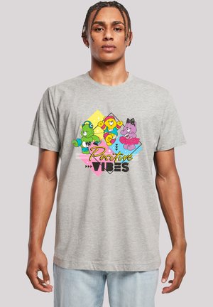 Gray cotton t-shirt featuring colorful cartoon bears and text “Positive Vibes.” The design includes geometric shapes in yellow, pink, and blue.