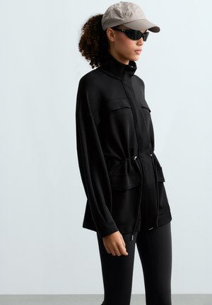 OYSHO, LONG JACKET WITH MODAL AND SOFT TOUCH POCKETS - Pitkä takki - black