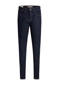 Vaqueros de mezclilla azul oscuro con un corte ajustado. Presenta cinco bolsillos, cremallera y costuras contrastantes a lo largo de las costuras. Textura suave.