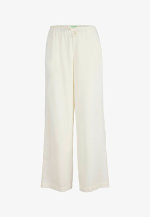 Pantalone širokog kroja krem boje s elastičnim pojasom i vezicom. Mekani, lagani materijal s glatkom teksturom i bez vidljivih uzoraka.