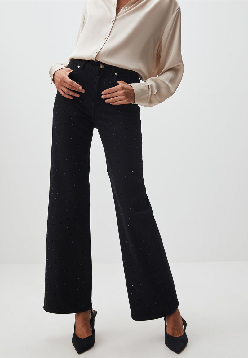 Jimmy Key WIDE LEG SHINY STONES - Jeans a zampa - black