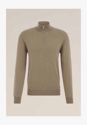 Pull en laine marron à col zippé en tissu doux. Il possède des manches longues et des poignets et un ourlet côtelés. Design simple et minimaliste.