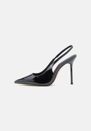 Black patent leather slingback pump with pointed toe, slender high heel, and a curved cutout design on the side. Smooth, shiny finish.