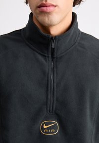 Nike Sportswear AIR - Φλις πουλόβερ - black/metallic gold