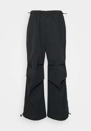 YOURTURN UNISEX - Pantalones - black