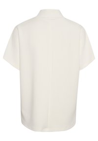 White short-sleeve blouse with a high collar, soft texture, and smooth fabric. Features a simple, minimalistic design with a back seam.