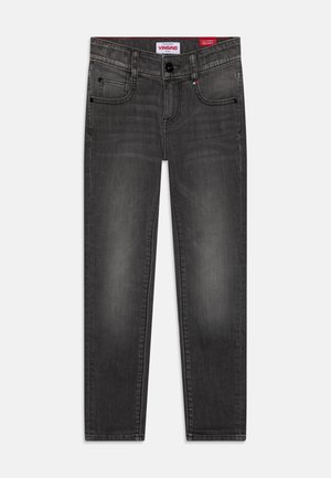Jeans skinny grigio scuro con tasche frontali e passanti per cintura, caratterizzati da un leggero scolorimento sulle cosce e chiusura con bottone in vita.
