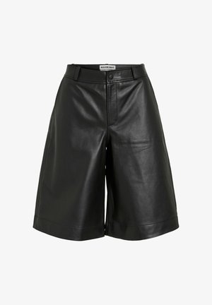 Mustad kõrge vöökohaga nahkšortsid, millel on vöölõngad, esine nupp ja tõmblukk, sildi all "Rouge Edit", esitatud valgel taustal.