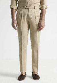 Pantalones - arena