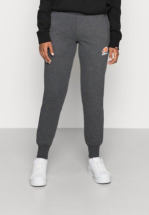 Pantaloni jogger in cotone grigi con design affusolato e polsini a costine. Presentano un piccolo logo sulla coscia in colori a contrasto.