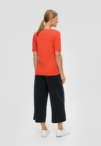 s.Oliver STRETCH - T-shirt print - orange