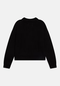 Calvin Klein Jeans FLUFFY MONOGRAM - Stickad tröja - black