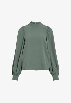 Blusa a maniche corte e collo alto in verde spento. Presenta maniche a sbuffo e un tessuto testurizzato con zip sul retro per la chiusura.