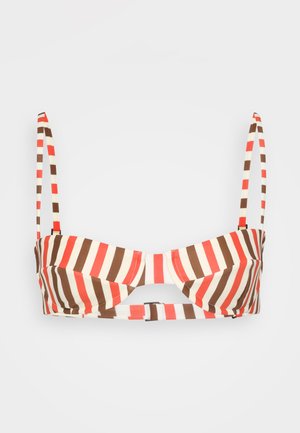 Striped bikini top featuring alternating red, brown, and cream colors. Structured shape with adjustable straps and a central cut-out detail.
