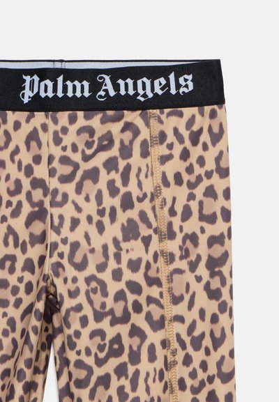 Leggings imprimés léopard avec coutures visibles et une ceinture noire affichant le logo blanc "Palm Angels" en police gothique.