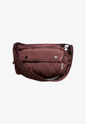 Maroon crossbody bag with front flap pocket secured by two snap buttons and an adjustable shoulder strap.
