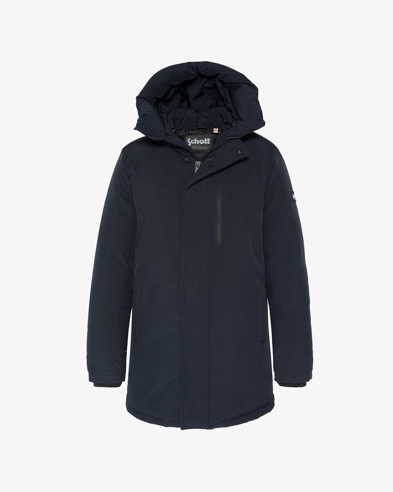 Abrigo de invierno acolchado en azul marino con capucha, cremallera frontal, bolsillo con cremallera en el pecho y etiqueta de la marca Schott en el interior del cuello.