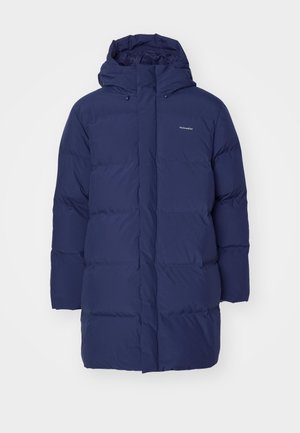 Navy blue puffer coat with a hood, featuring a zip closure and quilted texture. Branding visible on the upper left chest.