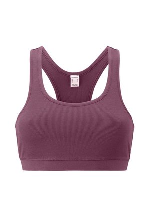Geribbelde sport-bh in diep mauve met een racerback-ontwerp, zachte textuur en brede banden. Zorglabel gestikt aan de binnenkant.
