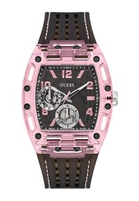 Montre transparente rose avec un boîtier rectangulaire, un cadran noir, de grands marqueurs numériques et un bracelet en caoutchouc brun avec des découpes. Deux sous-cadrans présents.