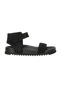 Black suede sandal with two wide straps, adjustable Velcro, and a contoured sole featuring textured grooves for grip.