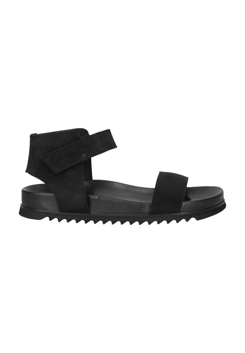 Black suede sandal with two wide straps, adjustable Velcro, and a contoured sole featuring textured grooves for grip.