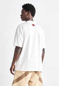 HUGO DANIRICK - Marškinėliai su spaudiniu - open white