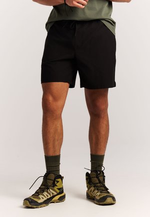 QUINTON - Trainingsbroek - true black