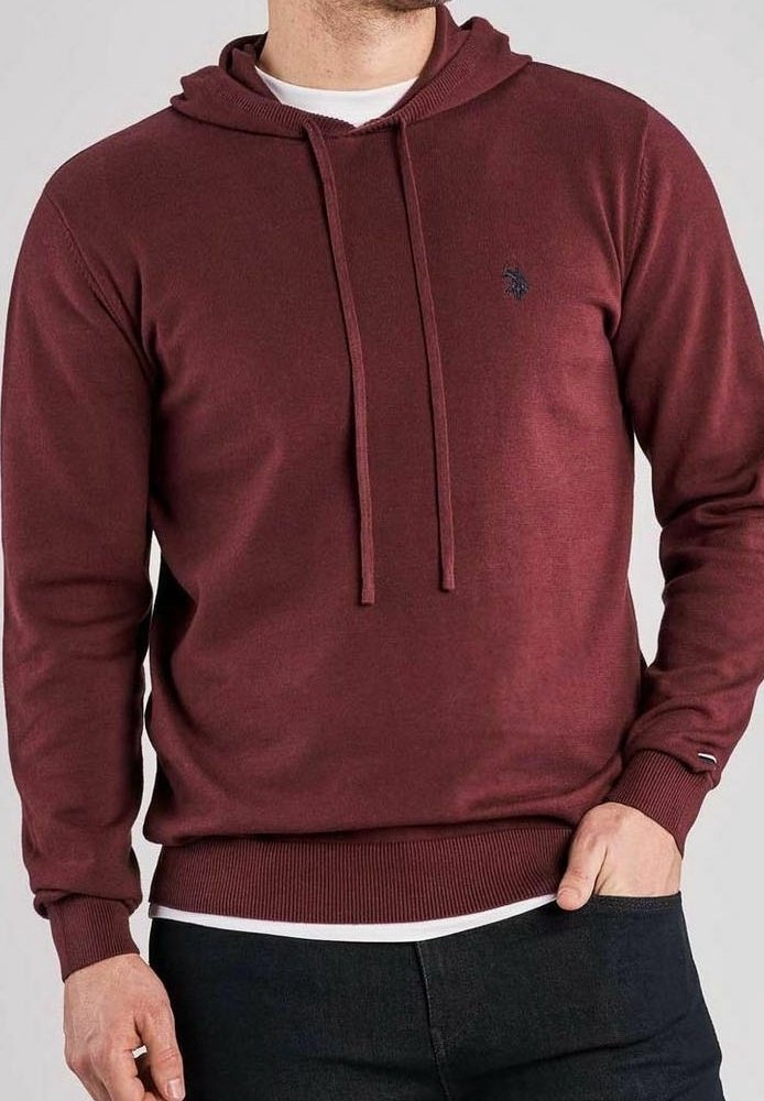 Sweat à capuche bordeaux en tissu doux. Comprend une poche kangourou, des poignets côtelés et un petit logo sur la poitrine.