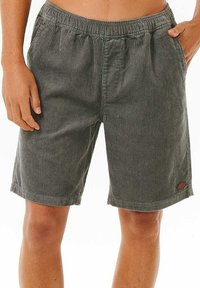 Katoenen shorts van corduroy met een gestructureerd, verticaal ribbelpatroon in saliegroen, met een elastische tailleband en zijzakken. Kleine logo label op de zoom.