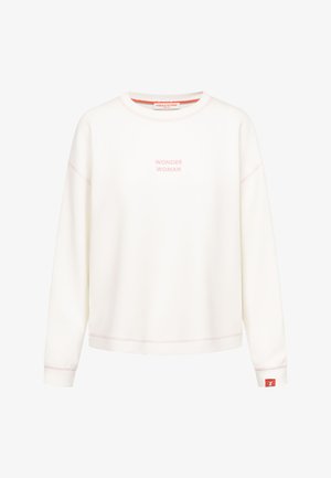 Witte sweatshirt met lange mouwen en roze "WONDER WOMAN" tekst op de borst, ronde halslijn en een klein rood label aan de linkermouw.