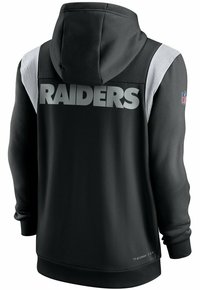 Sudadera negra con "RAIDERS" en letras grandes grises en la parte posterior. Presenta un panel texturizado en los hombros y el texto "THERMA FIT" en la cintura.