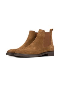 Botas de tobillo de ante marrón con paneles laterales elásticos y suela de goma plana. Diseño clásico con una textura suave y detalles mínimos.
