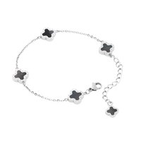 Silver chain bracelet featuring five flower-shaped links with black accents, a lobster clasp, and an adjustable extension chain.