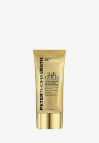 24K Guld Ren Lyx Lyfta & Fast Prismakräm i en guldig tub med svart text och ett guldlock; iriserande finish; 1,7 fl oz / 50 ml.