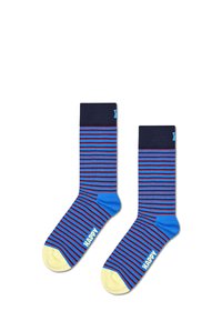 Skarpetki w niebiesko-granatowe paski z czerwonymi i żółtymi akcentami; maj�ą ściągacze i napis "HAPPY" z boku. Materiał wydaje się miękki.