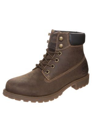 Brązowy skórzany botek za kostkę z wyściełanym czarnym kołnierzem, sześcioma metalowymi oczkami na sznurowadła i wytrzymałą gumową podeszwą.