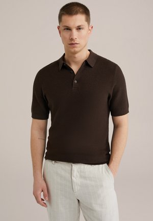 Brown short-sleeve polo shirt with a textured knit, ribbed cuffs, and a classic collar. Features two buttons at the neck and a fitted design.