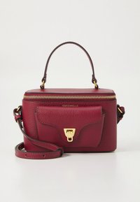 Borsa a mano in pelle bordeaux con manico superiore e tracolla regolabile, dotata di chiusura a zip, tasca frontale e dettagli in oro.