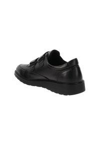 Czarne skórzane sneakersy o niskim profilu, z amortyzowaną podeszwą, dwoma paskami do zapięcia oraz gładką teksturą.