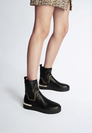 Baskets montantes - black
