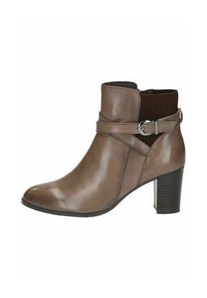 Brown leather ankle boot with a polished finish, elastic side panel, and a decorative strap featuring a silver buckle. Heeled sole.