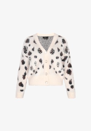 Cardigan crémeux flou avec taches noires et brunes, présentant des accents en perles et de grands boutons. Longueur cropped et design en V.