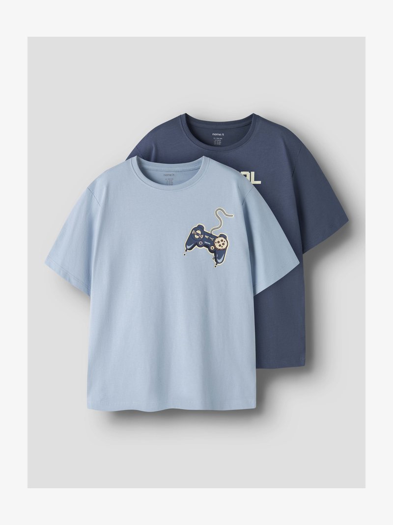 Two short-sleeve crew neck T-shirts, one light blue with a game controller graphic, one navy blue with partial off-white text.