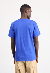 The North Face M SS FINE TEE - Majica kratkih rukava s printom - blue/black
