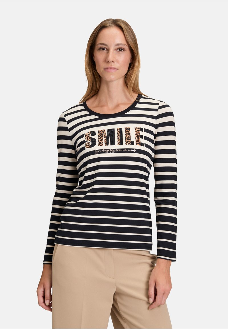 Langärmliges gestreiftes T-Shirt in marineblau und creme, mit „SMILE“ im Leopardenmuster, rundem Halsausschnitt und weichem Stoff.