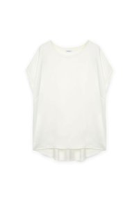 Blouse blanche à manches courtes avec un col rond et un ourlet légèrement incurvé, présentée sur un fond blanc.
