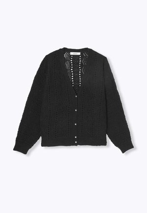 Gilet en tricot noir avec un col en V et une ouverture à l'avant. Présente des motifs complexes, des manches longues et six boutons. Fini texturé.