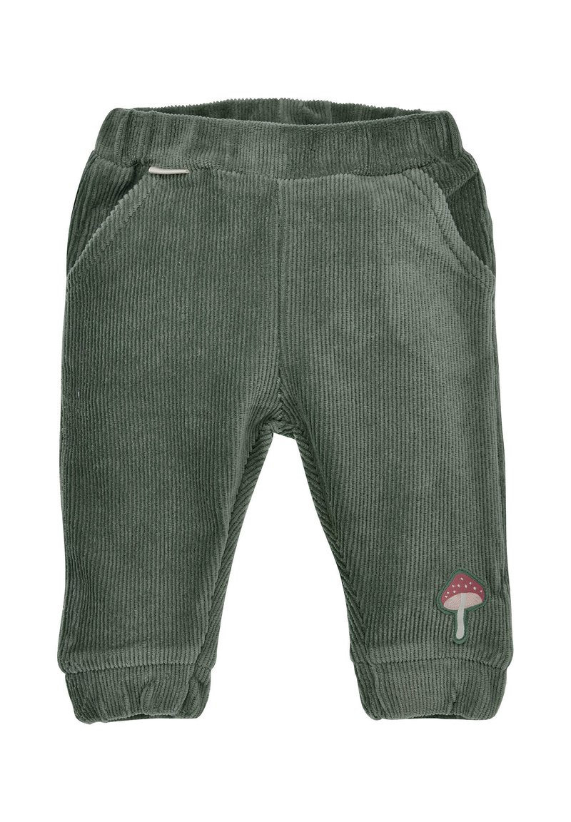 Grüne Cordhosen mit elastischem Bund, zwei seitlichen Taschen und einem Pilz-Patch-Detail am unteren linken Bein. Weicher Stoff, taillierte Passform.